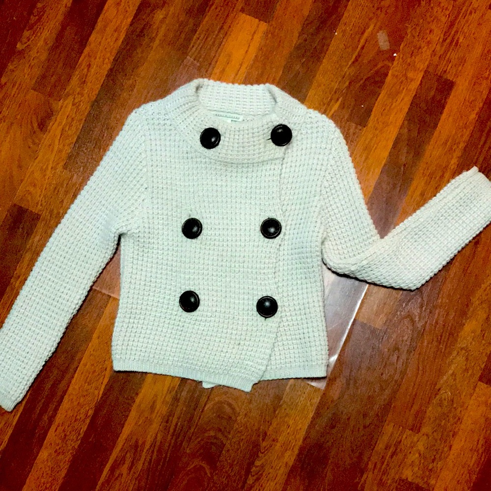 Chunky knit cream sweater from Robert Kitchen